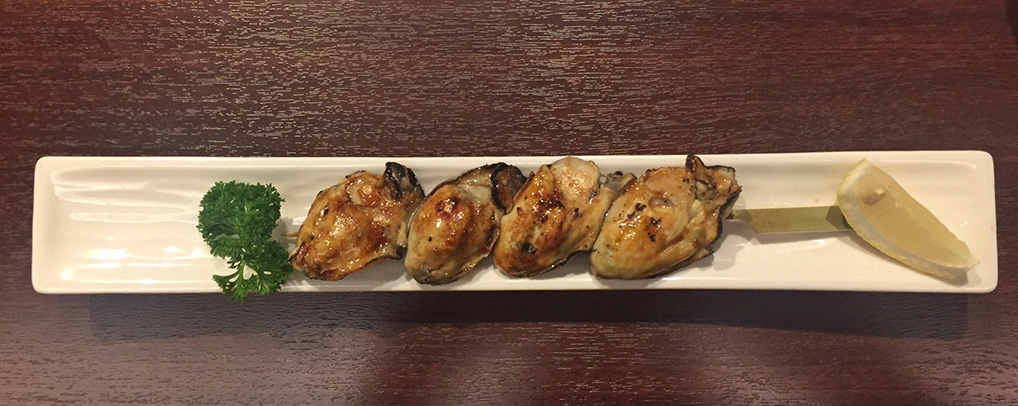 Cena a base di ostriche tipiche di Miyajima